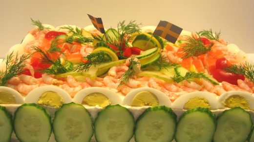 image shows a Swedish sandwich cake with shrimp and eggs