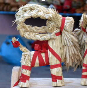 image shows a Swedish straw Christmas goat