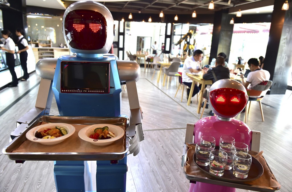 image shows robots serving food