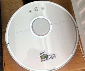 image shows a roomba