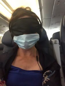 image shows woman with both eye mask and mouth mask