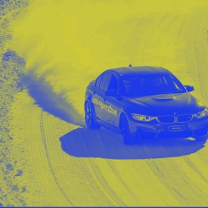 image shows car on Swedish icy driving course