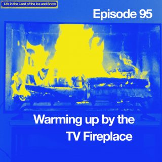image shows a photo of a fireplace being played on a t.v.