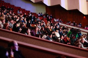 Crowds of parents at theatre