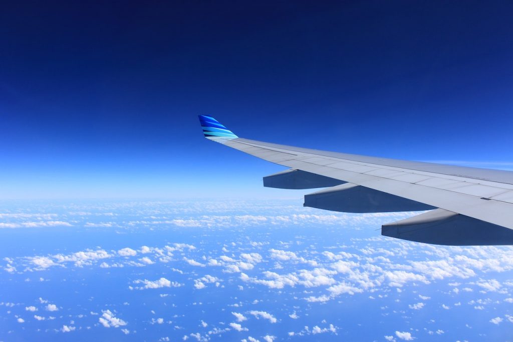 image shows an airplane in flight