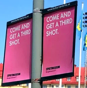 image shows ad from the spirits museum talking about a third shot (of a drink instead of vaccine)