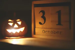 image shows a jack-o-lantern and the date of October 31