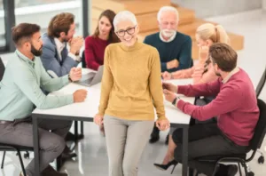 image shows a bunch of people in a stock photo of an office